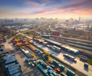 Aerial view of container loading and unloading at sunset